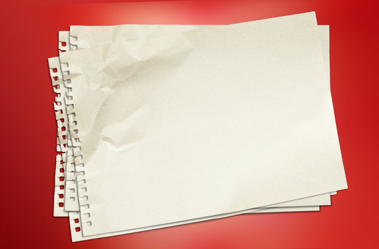 White blank paper on red background