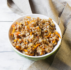Buckwheat with carrots in light background