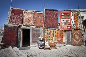 Rolgordijnen Turkish Rugs Hanging in a Market © Scott Griessel