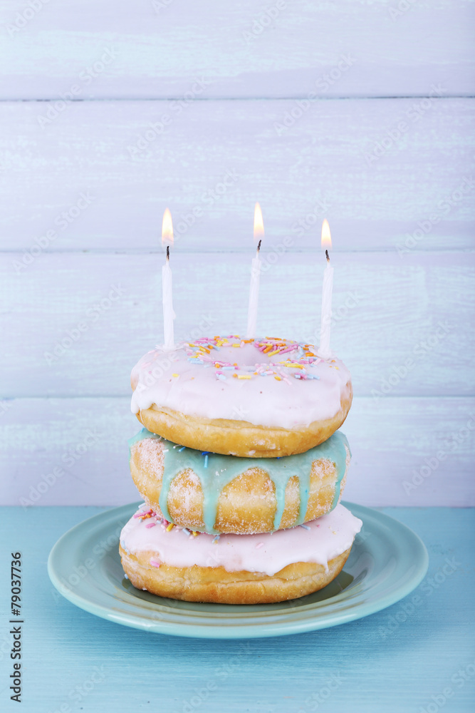 Sticker delicious donuts with icing and birthday candles