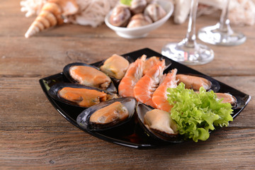 Tasty seafood on plate on table close-up