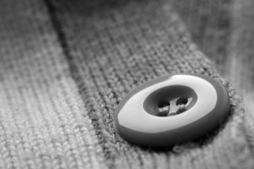 Button on clothes close up