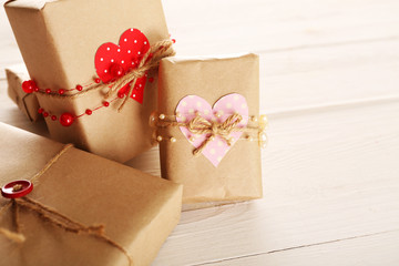 Beautiful gift boxes on wooden background. Valentine Day