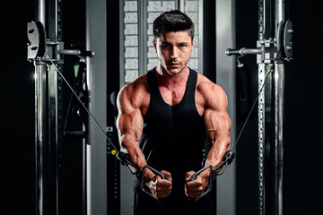 Fototapeta na wymiar handsome man work out in gym