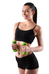 Portrait of happy fitness woman with green dumbbells