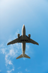 Passenger Airliner flying in the clouds