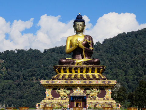 Beautiful giant gold statue of the Lord Buddha at Rabangla Sikkim in India
