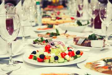Greek salad on the festive table