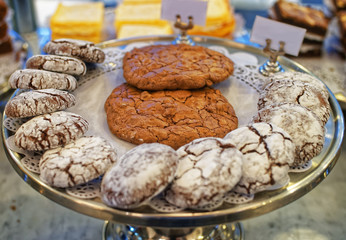 Different types of hand-made chocolate bisquits on the tray