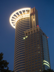 Dynamic skyscraper at night in Frankfurt, Germany