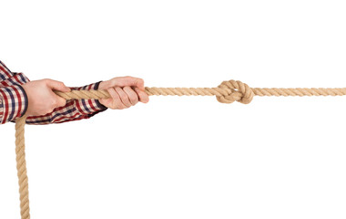 man pulling a rope, isolated on white
