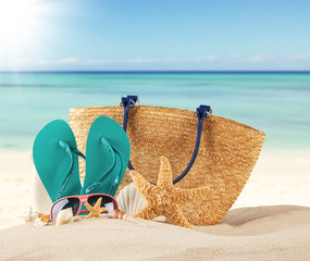 Summer beach with blue sandals and shells © Jag_cz