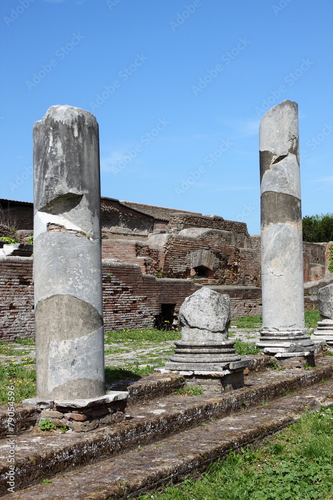 Wall mural Columns of an ancient roman temple in Ostia Antica. Rome, Italy