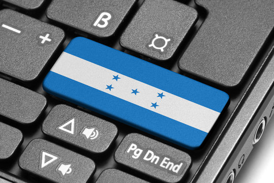Go to Honduras! Computer keyboard with flag key.