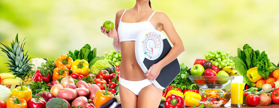 Woman with apple and scales.