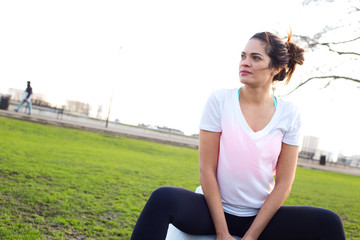 woman with a gym ball in the park