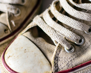 Pair of old sneakers closeup