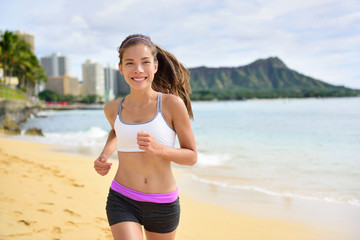 Running sport fitness woman jogging on beach run