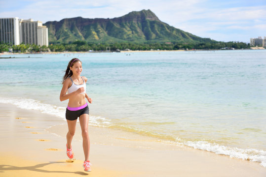Runner - Sport running fitness woman beach jogging