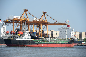 Container cargo freight ship with blue sky
