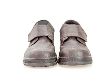 Old black safety shoe for worker