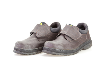 Old black safety shoe for worker