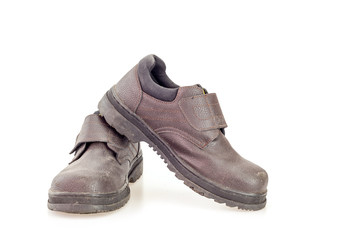 Old black safety shoe for worker