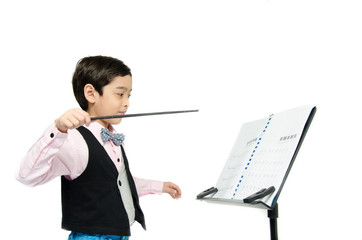 Little boy pretend as conductor leader on white background