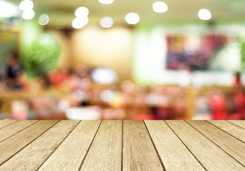 Perspective wood and blurred cafe with bokeh light background