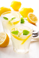 glasses of lemonade with fresh fruits