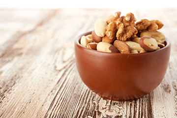 Mix nuts  on wooden background