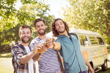 Hipster friends having a beer together