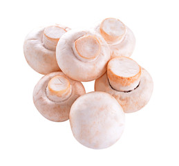 Heap of champignon mushrooms. Isolated on white background