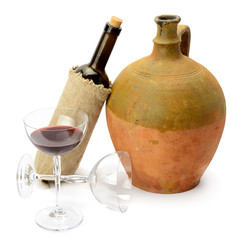 glass of wine, bottle and amphora