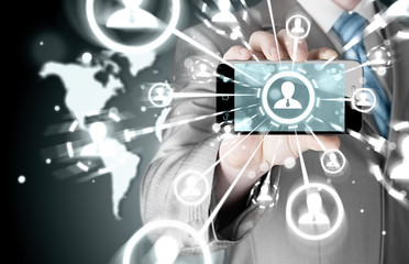 Business Hand holding a phone show the social network