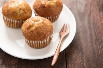 muffins on a wooden table