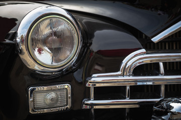 Old vintage car front lights or headlights