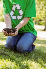 Environmental activist about to plant tree