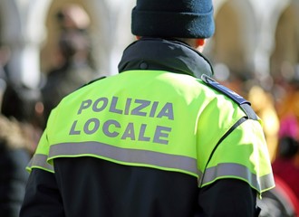 Italian policeman with police uniform with written