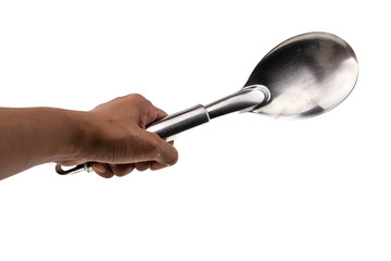 Hand with cooking spoon