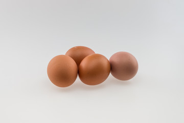 Four eggs. Isolated on white background