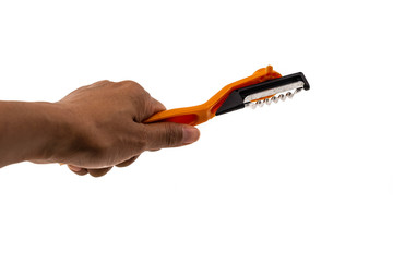 hand held vegetable and fruit peeler isolated on white backgroun