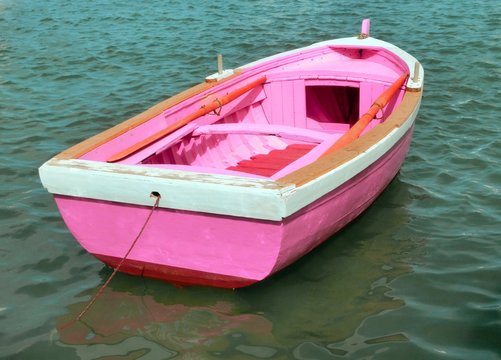 Pink Boat In The Middle Of The Ocean