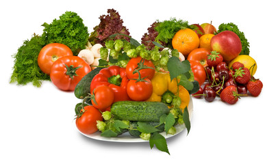 Fototapeta na wymiar many fresh vegetables and berries on a plate
