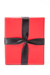 Red gift box on white background isolated