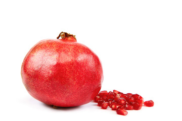 Fresh pomegranate on white background.