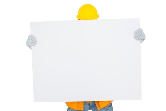 Handyman holding blank placard