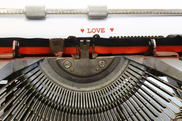 written LOVE with red ink