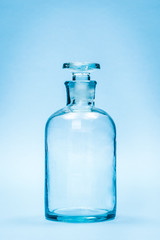 Empty clear reagent bottle with glass stopper