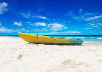Fototapeta na wymiar Colorful kayaks on the tropical beach